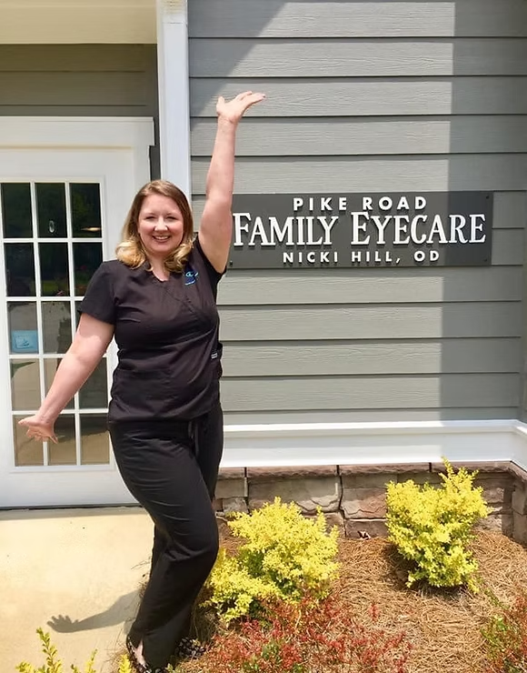 Dr. Hill in front of the office of Pike Road Family Eye Care